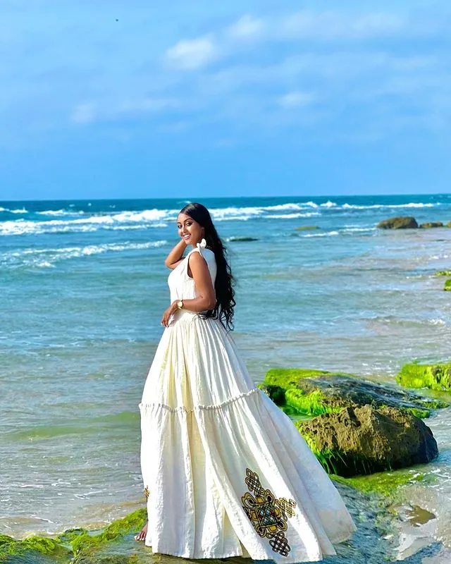 Modern Fusion Habesha Dress With a Cross Design at the bottom Traditional Ethiopian Dress